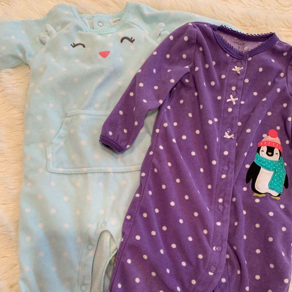 Two fleece baby girl onesies